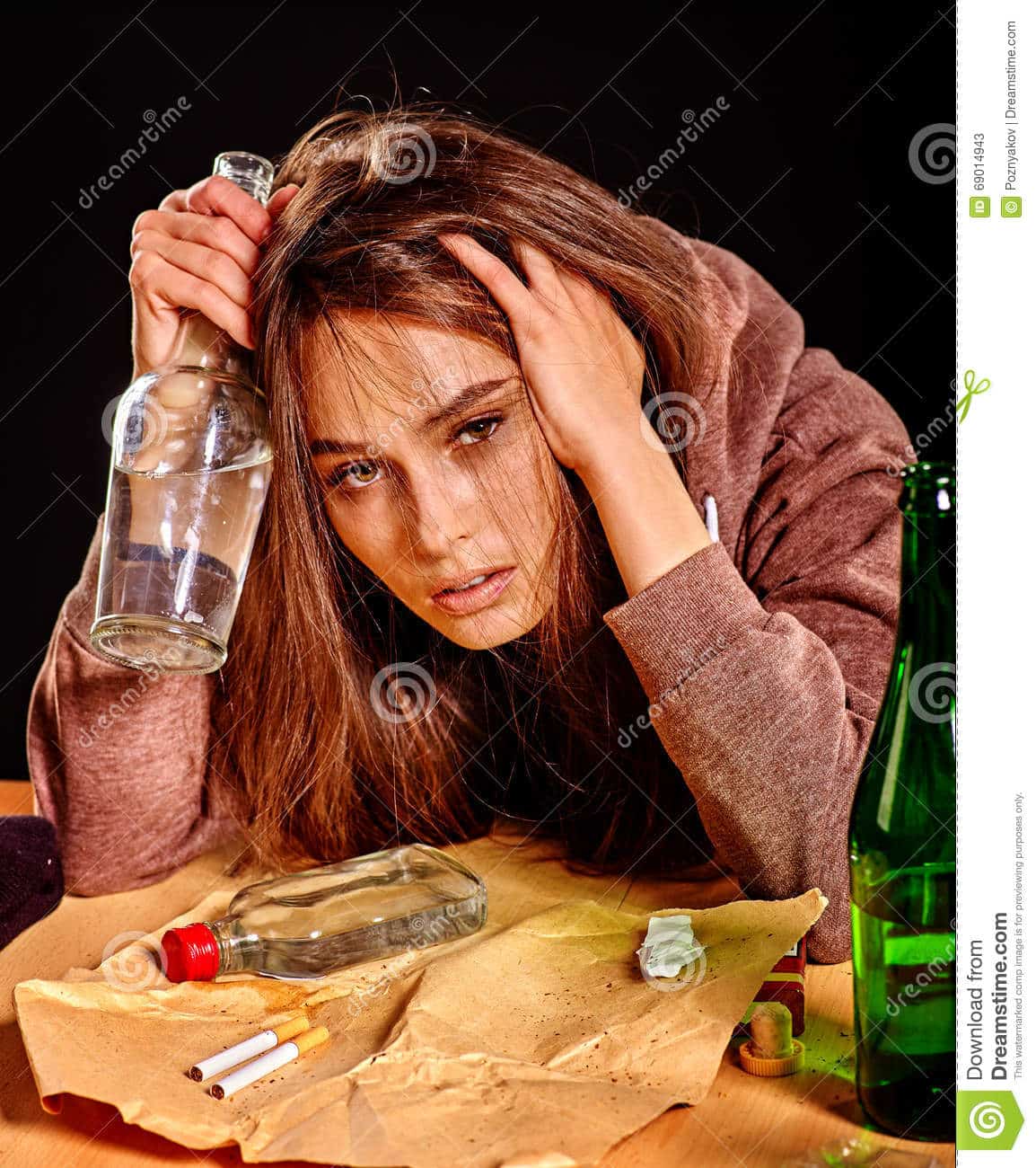 Girl in Depression Drinking Alcohol. Stock Image