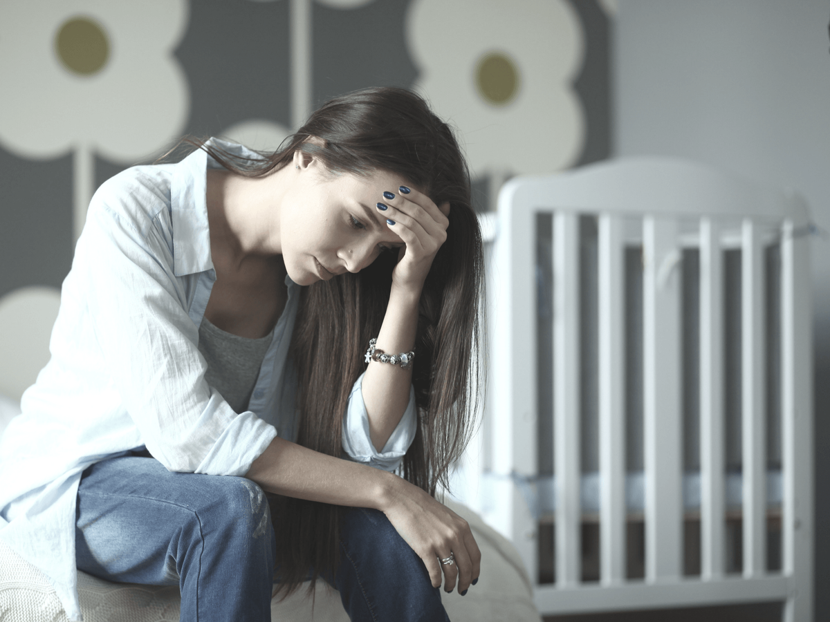 How to Deal with Postpartum Depression: Symptoms and ...
