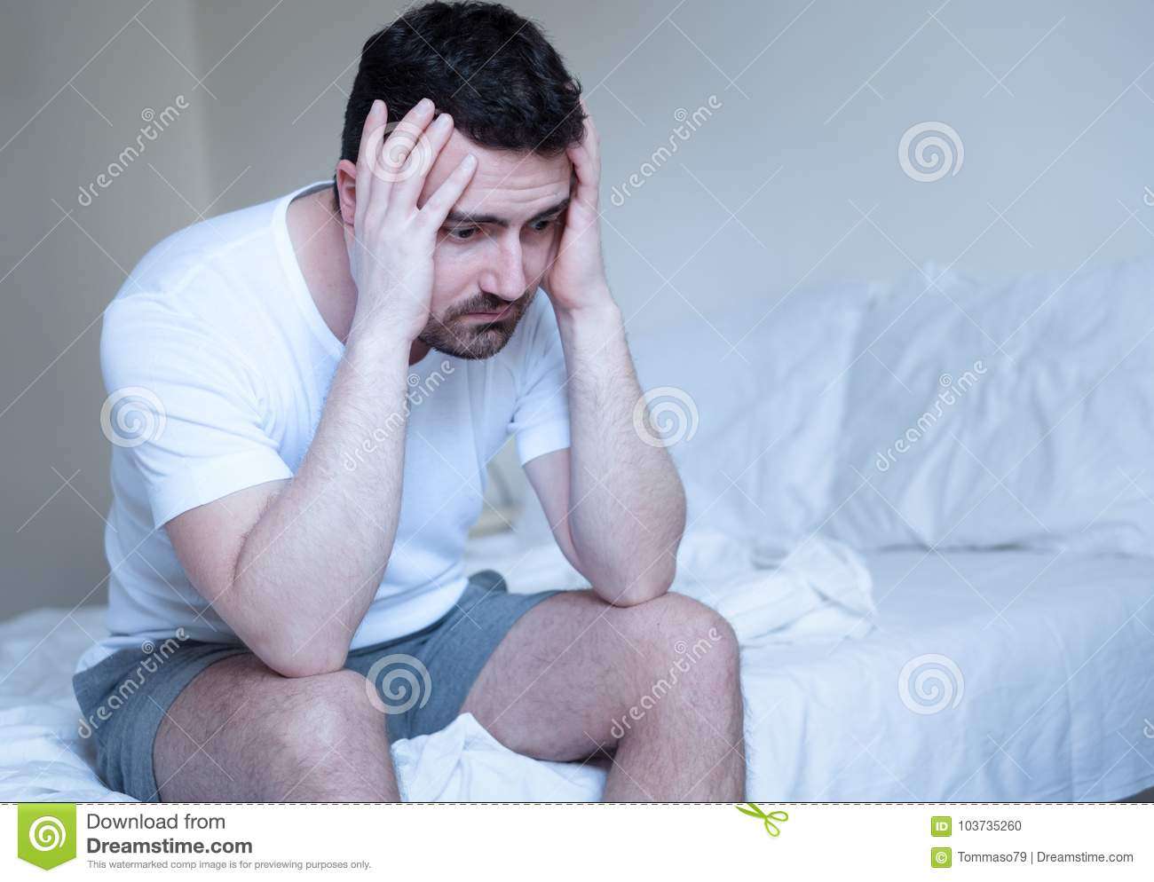 Sad And Upset Man Waking Up In The Morning Stock Photo ...